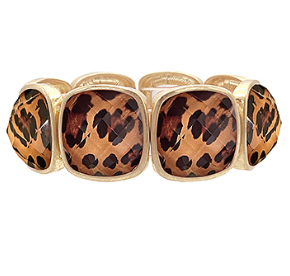 Gold stretch bracelet with bold leopard print resin stones; statement animal print jewelry.