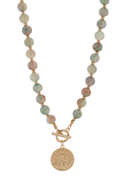 Beaded necklace with natural stone beads, gold toggle clasp, and Roman coin pendant.