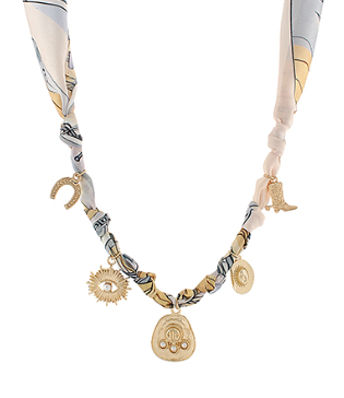 Printed scarf necklace with western-inspired gold charms: horseshoe, boot, sunburst, and coins.